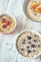 Three bowls of oatmeal photo