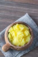 Bowl of ghee clarified butter photo