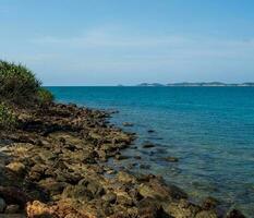 Landscape summer frontview panorama tropical seabeach rock blue sky white sand background calm Nature ocean Beautiful wave crash splashing water travel Khao Leam Ya National Park East thailand Exotic photo