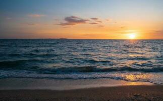 Panorama front viewpoint landscape travel summer sea wind wave cool on holiday calm coastal big sun set sky light orange golden Nature tropical Beautiful evening hour day At Bang san Beach Thailand. photo