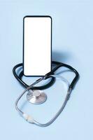 Phone mockup with stethoscope. Digital healthcare and medicine online concept photo