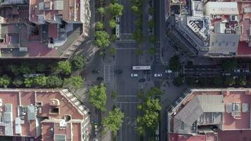 Vehicles Driving Through an Intersection in Barcelona City Bird's Eye View video