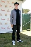 Adam Hicks arriving at the A Time For Heroes Celebrity Carnival benefiting the Elizabeth Glaser Pediatrics AIDS Foundation at the Wadsworth Theater Grounds in Westwood  CA on June 7 2009 2009 photo