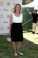 Virginia Madsen  arriving at A Time For Heroes Celebrity Carnival benefiting the Elizabeth Glaser Pediatrics AIDS Foundation at the Wadsworth Theater Grounds in Westwood  CA on June 7 2009 2009 photo