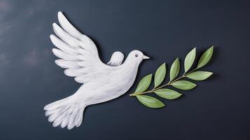 White dove with olive branch on a dark background. International Peace Day Concept, photo