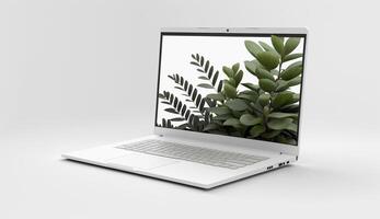 Laptop mockup with green leaves on white background, photo