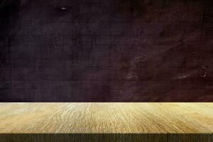 Wood Table with Old Grunge Blackboard Background, Suitable for Product Presentation Backdrop, Display, and Mock up in Education Concept. photo