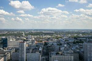 landscape of the city of Warsaw from the vantage point in the Palace of Culture on a warm summer sunny day photo