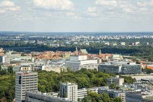 landscape of the city of Warsaw from the vantage point in the Palace of Culture on a warm summer sunny day photo