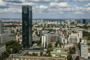 landscape of the city of Warsaw from the vantage point in the Palace of Culture on a warm summer sunny day photo