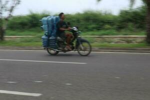 Bekasi, Indonesia in March 2019. Attempted a panning photo but failed.