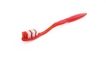 un cepillo de dientes aislado en blanco antecedentes. foto