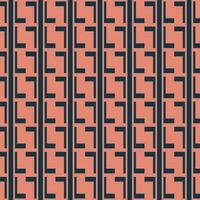 Picture the pattern of the letter L motif arranged in orange and navy blue. photo