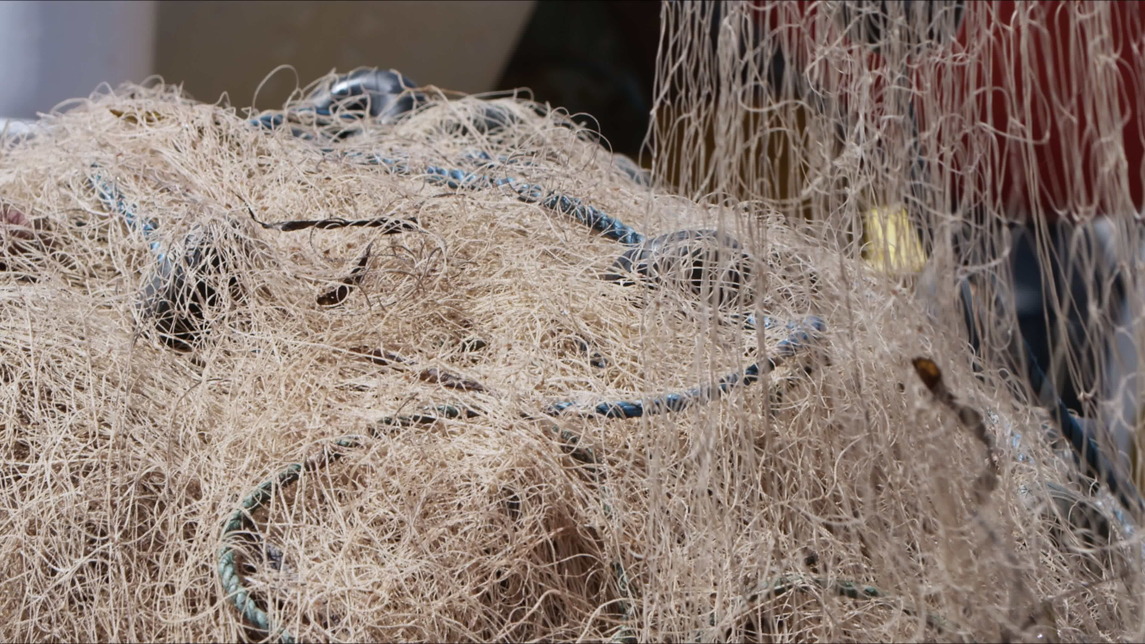 Fisherman is Repairing Fishnets on Fishing Boat in Dock 23503425 Stock  Video at Vecteezy