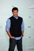 Justin Bruening arriving  at  the Premiere of Hes Just Not That Into You in Los Angeles CA on February 2 20092008 photo