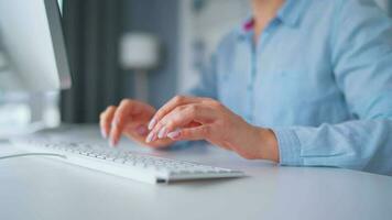 Woman typing on a computer keyboard at home office, monitor with a green screen. Chroma key. Copy Space. Concept of remote work. video