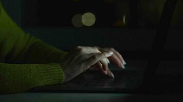 Woman typing on a computer keyboard at home office, monitor with a green screen. Chroma key. Copy Space. Concept of remote work. video