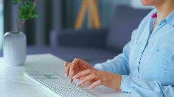 Female hands typing on a computer keyboard. Concept of remote work video