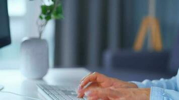 Female hands typing on a computer keyboard. Concept of remote work video