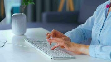 Female hands typing on a computer keyboard. Concept of remote work video