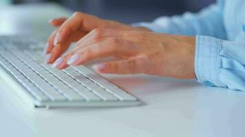 Female hands typing on a computer keyboard. Concept of remote work video