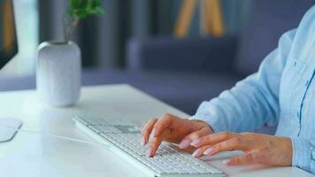 Female hands typing on a computer keyboard. Concept of remote work video