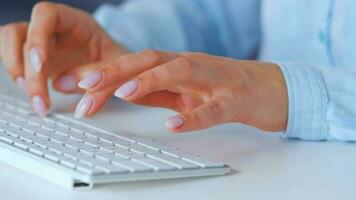 Female hands typing on a computer keyboard. Concept of remote work video