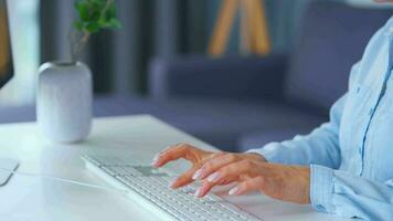 Female hands typing on a computer keyboard. Concept of remote work video