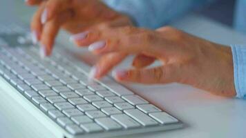 Female hands typing on a computer keyboard. Concept of remote work video