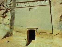 Beautiful daytime view of Al Hegra, Madain Saleh archaeological site in Al Ula, Saudi Arabia. photo