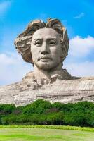 CHANGSHA, CHINA - OCT 29, 2017-Youth Mao Zedong Statue is located in Orange Isle, Changsha, Hunan, China. The monument stands 32 metres tall. photo