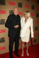 LOS ANGELES  DEC 16 Alan Hamel Suzanne Somers arrives at CNNs Larry King Live final broadcast party at Spago on December 16 2010 in Beverly HIlls CA photo