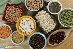 variety of legume seeds in bowls photo