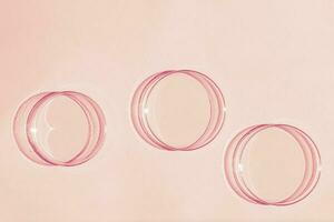 Petri dish. A set of Petri cups. A pipette, glass tube. On a pink background. photo