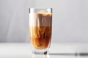 A latte macchiato in a glas on a white background created with technology. photo