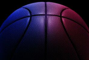 Closeup detail of basketball ball texture background. Blue neon Banner Art concept photo
