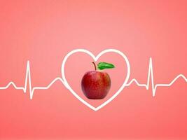Heartbeat line on red apple photo