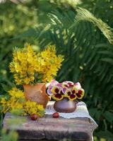 Still life with colorful flowers in the garden. Summer still life photo