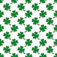Vector seamless pattern of hand drawn doodle sketch green shamrock clover isolated on white background.