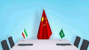 drapeaux de J'ai couru et saoudien Saoudite et papiers sur le tableau. négociations et signature un international accord médiatisé par Chine. conceptuel vidéo video