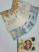 THR envelope containing money to be given to children or family or relations during Eid al-Fitr. photo