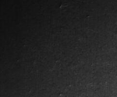 Black colored paper background photo