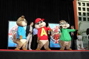 LOS ANGELES  NOV 1  Alvin and The Chipmunks at the Alvin  The Chipmunks Hand and Foot Print Ceremony at the Graumans Chinese Theatre on November 1 2011 in Los Angeles CA photo