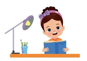 A boy is reading a book on a desk. vector