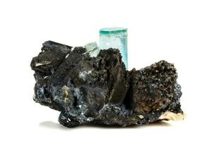 Macro mineral stone Aquamarine and black tourmaline, Schorl on a white background photo