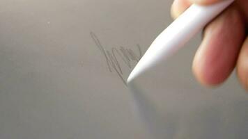 Giving signature with digital tablet and graphic on table video