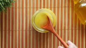 homemade ghee in container on a table video