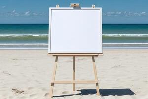 White blank artist frame on a small wooden easel on summer sea beach background with copy space. Advertising mockup artboard for pictures or artwork. Painting frame template banner. photo