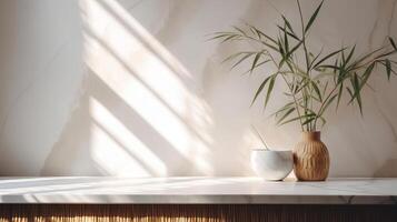 Sensitive beige cotton tablecloth on counter table, tropical dracaena tree in sunshine on white divider establishment. photo