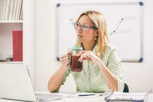 A businesswoman in her office photo